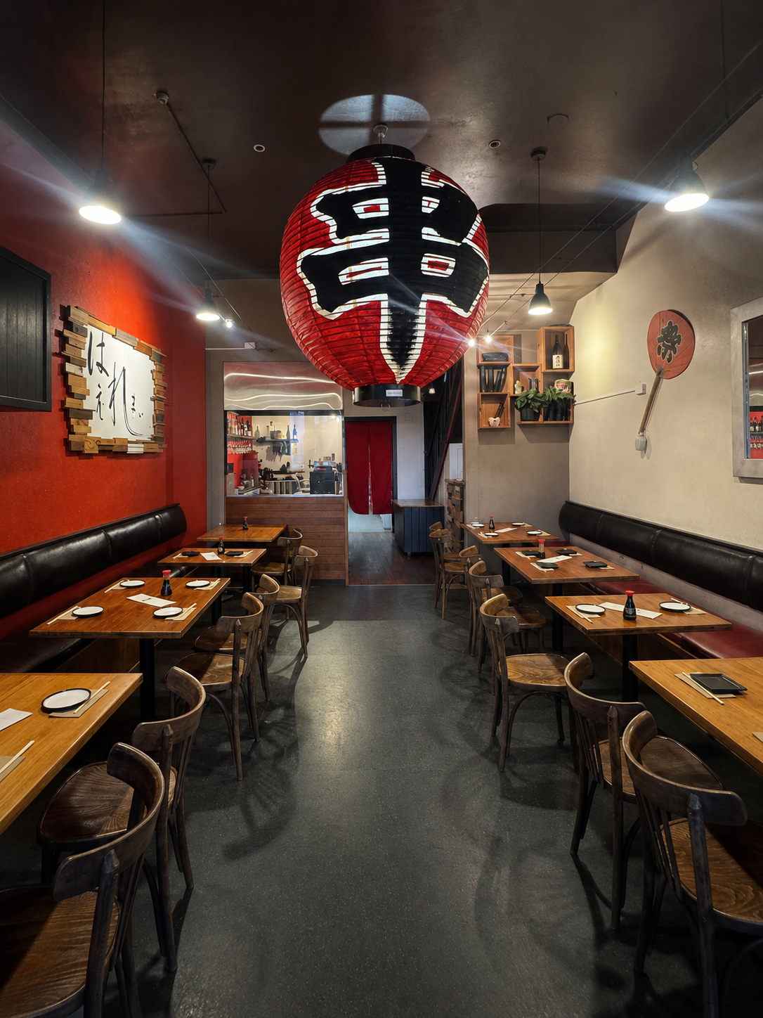 Taisho dining room beneath the restaurant’s signature red-and-black lantern